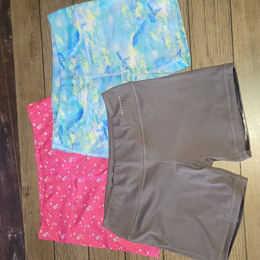 I Am Becoming shorts size medium. I am selling all 3 pairs together.
